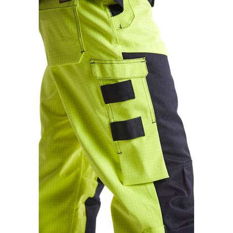 Blaklader Multinorm Winter Trousers 1868 #colour_hi-vis-yellow-navy-blue