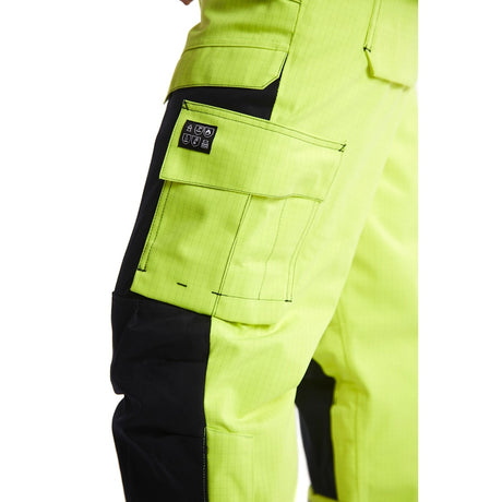 Blaklader Multinorm Winter Trousers 1868 #colour_hi-vis-yellow-navy-blue